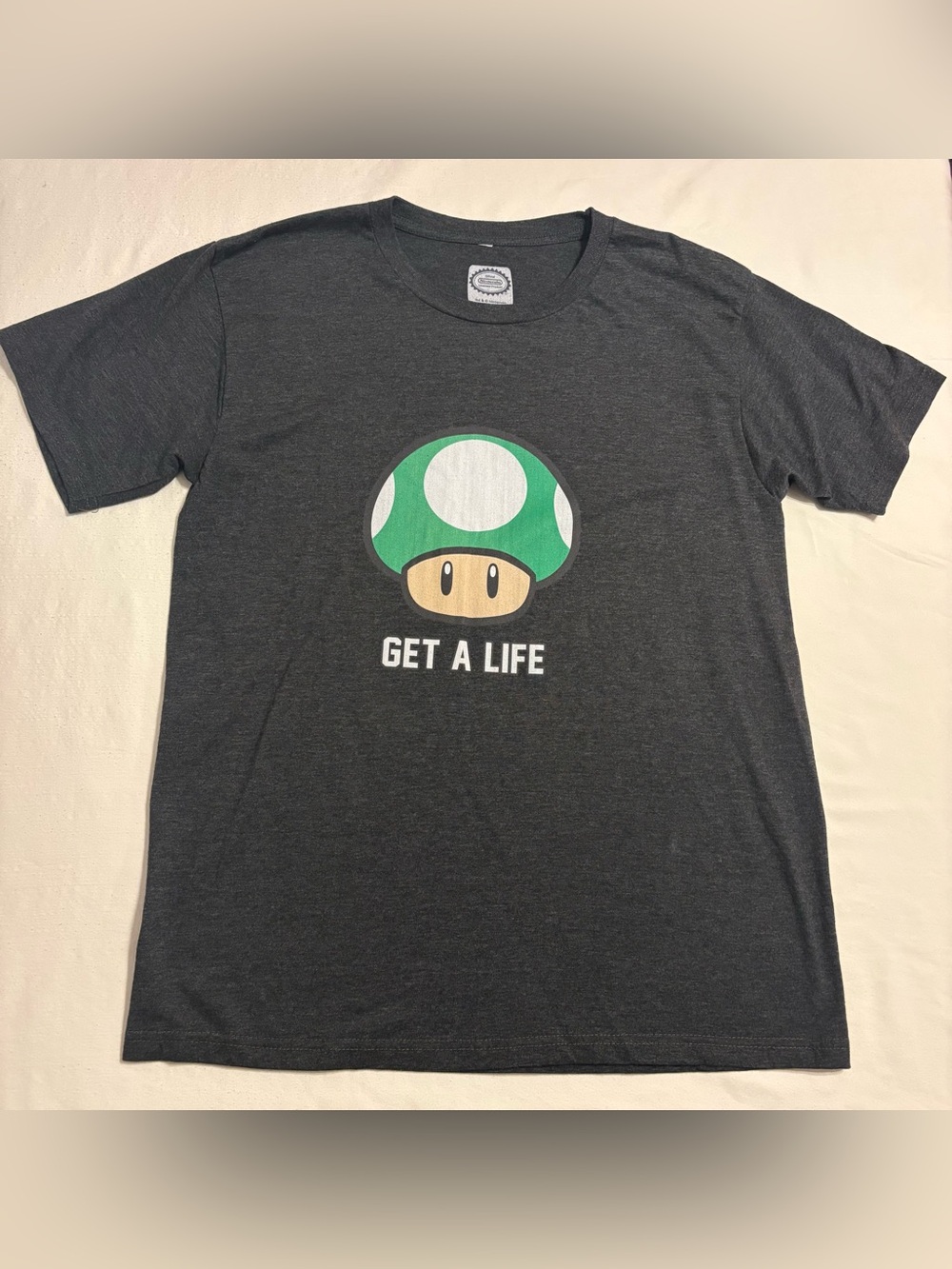 Nintendo Men's Dark Gray T-Shirt with Green 1-Up Mushroom Graphic- Get a Life